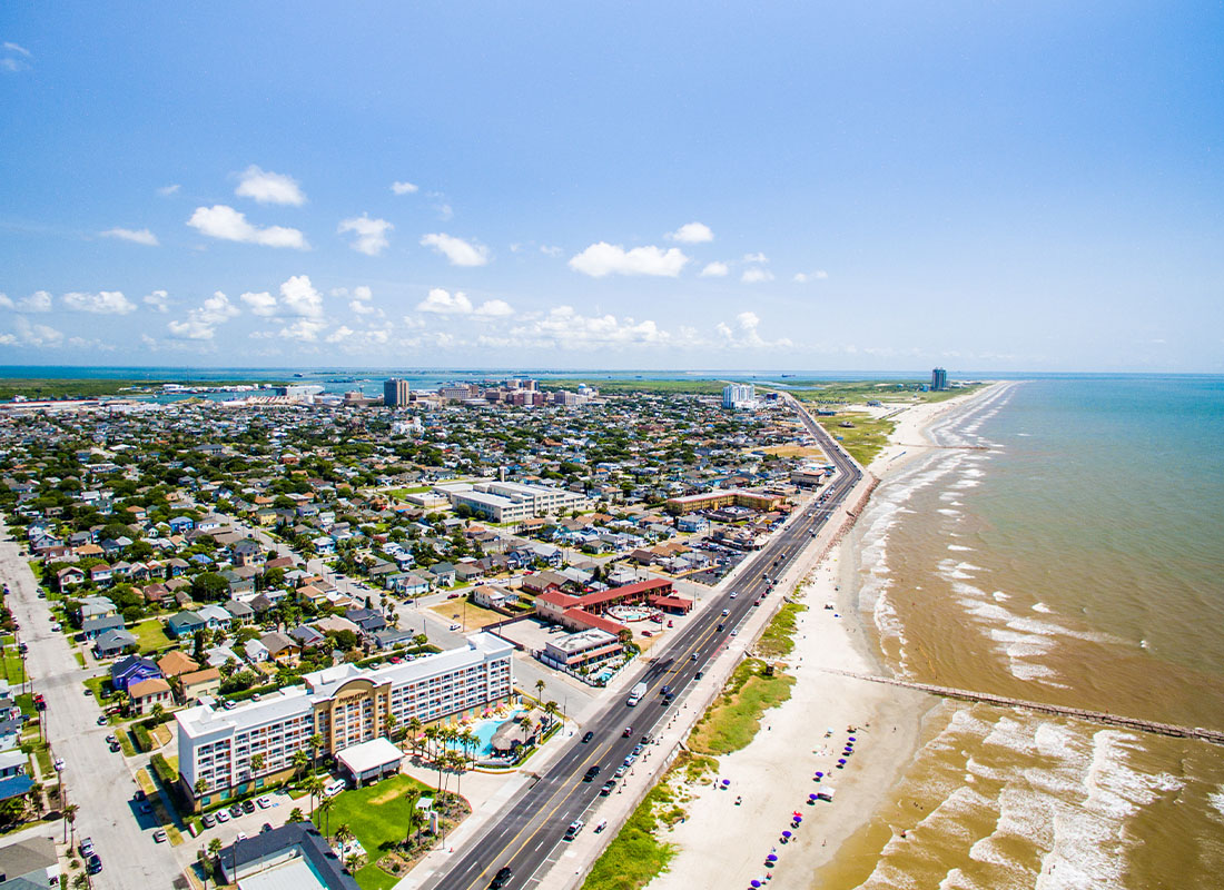 About Our Agency - An Aerial Shot of Galveston Texas on a Clear Nice Day